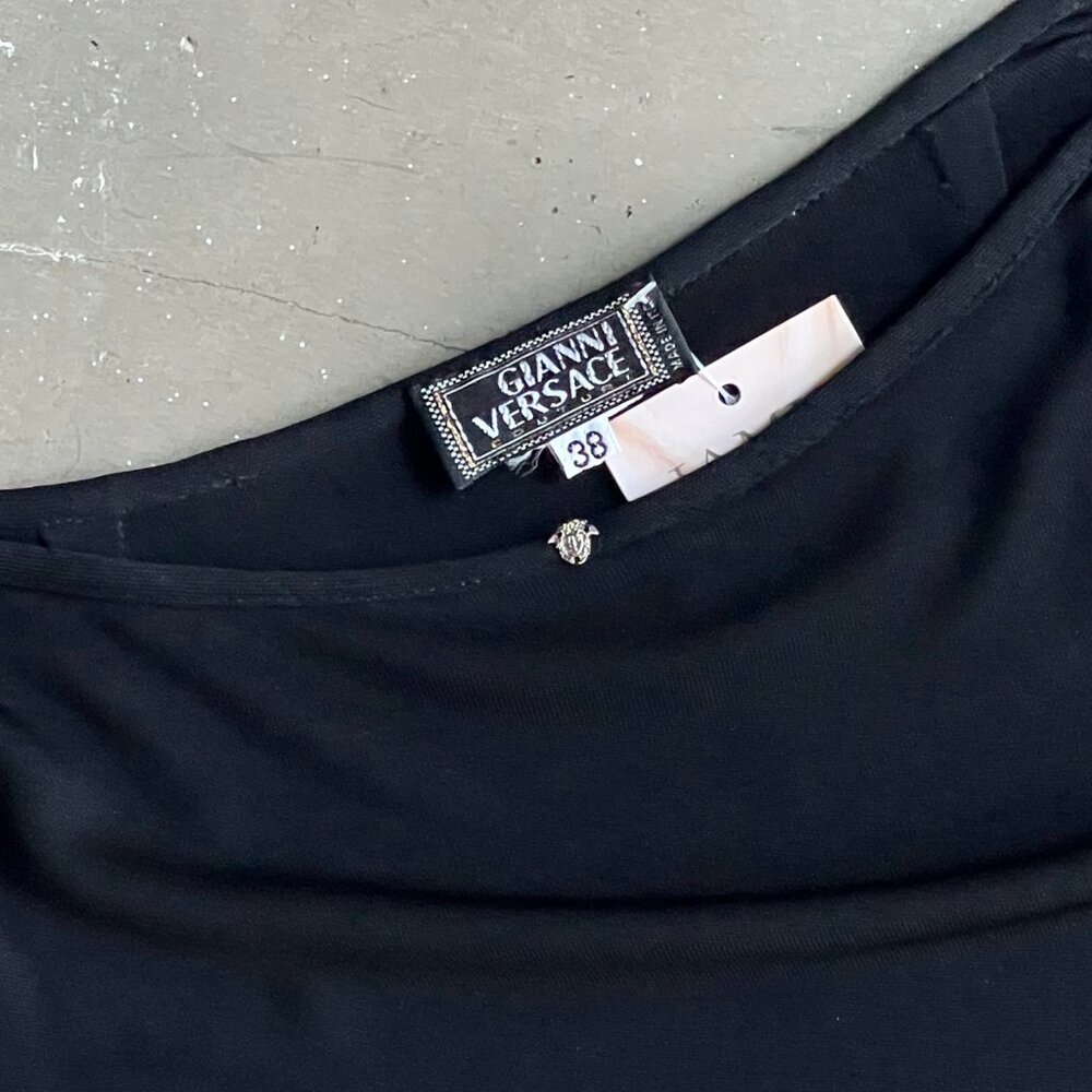 Black Versace a-line soft stretch wool skirt with a silver Medusa head stud